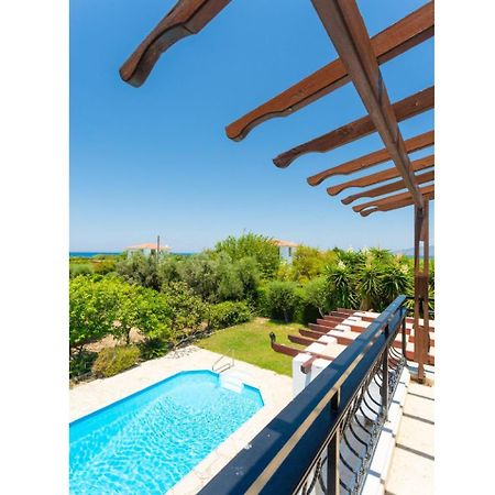 Sun Beach Villa Thio Polis Bagian luar foto