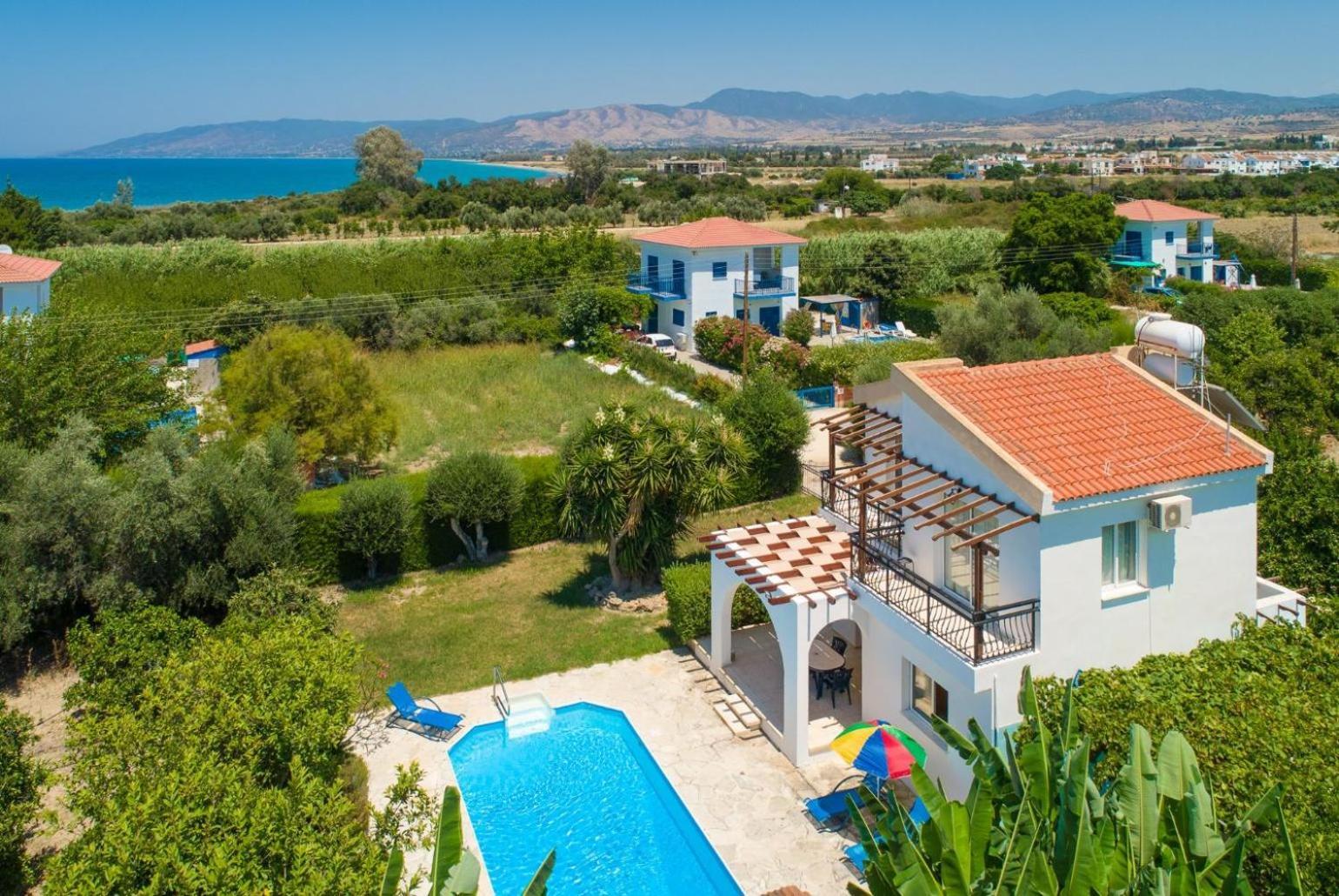 Sun Beach Villa Thio Polis Bagian luar foto